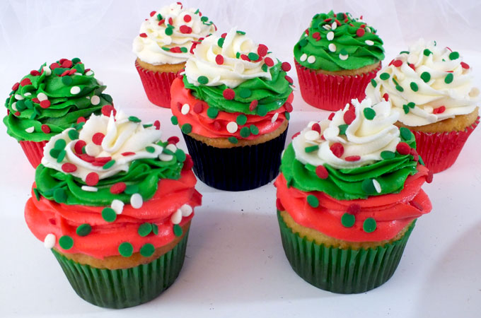Christmas Swirl Cupcakes - a beautiful Christmas Cupcake for your holiday parties. Christmas Desserts never looked so good. Follow us for more great Christmas Treats ideas.
