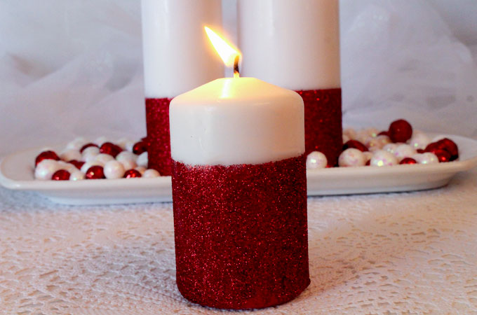 Glitter Candles - Easy DIY Christmas Decorations that you can make in less than 30 minutes! Make them for yourself or as a DIY Christmas Gift for someone special. Follow us for more great Christmas ideas and crafts.