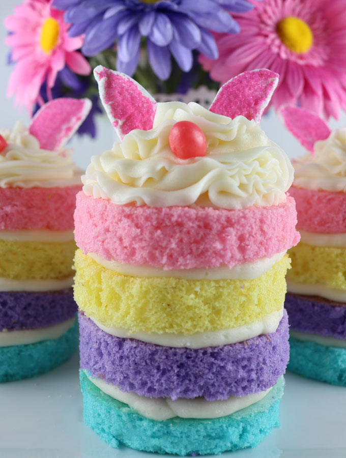 Bunny Mini Cakes - a unique take on a traditional Easter Cupcake. Wow your Easter Brunch guests with these adorable and delicious Easter Treats. Follow us for more fun Easter Food Ideas.