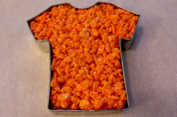 Mold Rice Krispie Treat mixture into the Jersey Cookie Cutter