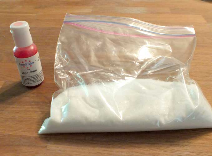 Pour white sugar into a plastic bag