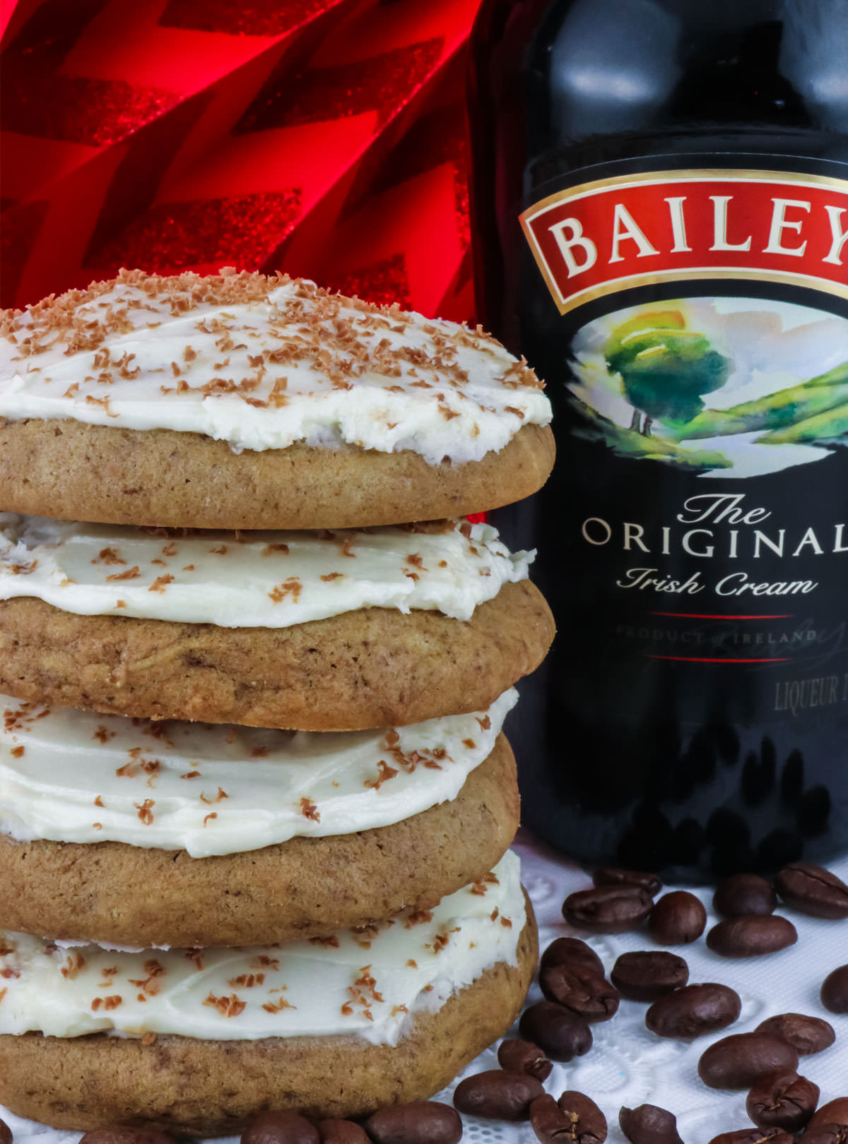 Closeup of a stack of Coffee Cookies sitting next to a bottle of Baileys Irish Cream.